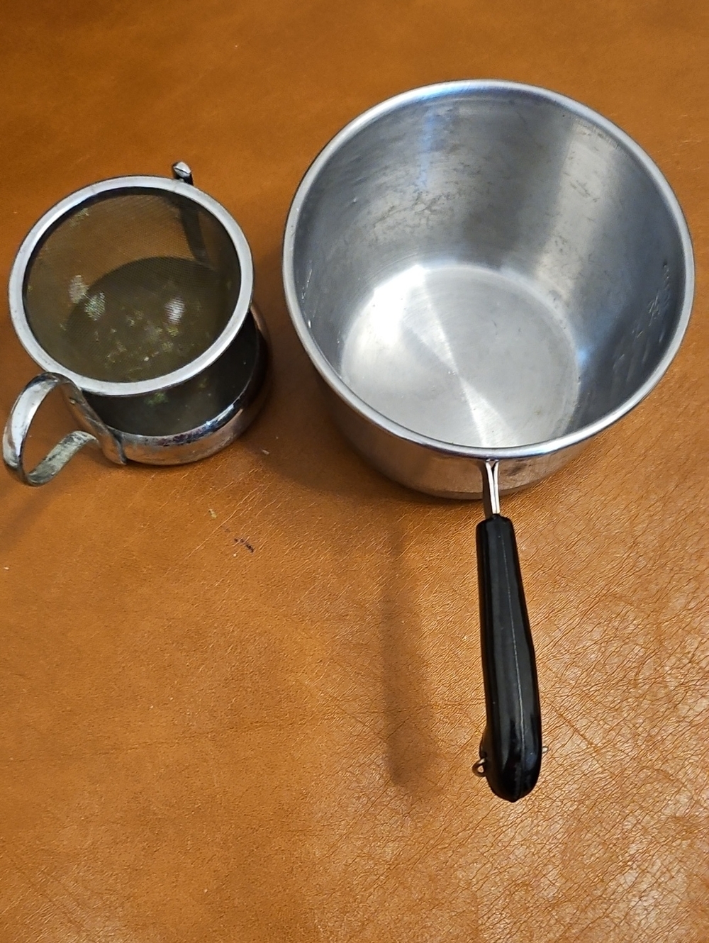 Swivel Tea Strainer And Vintage Measuring Cup.